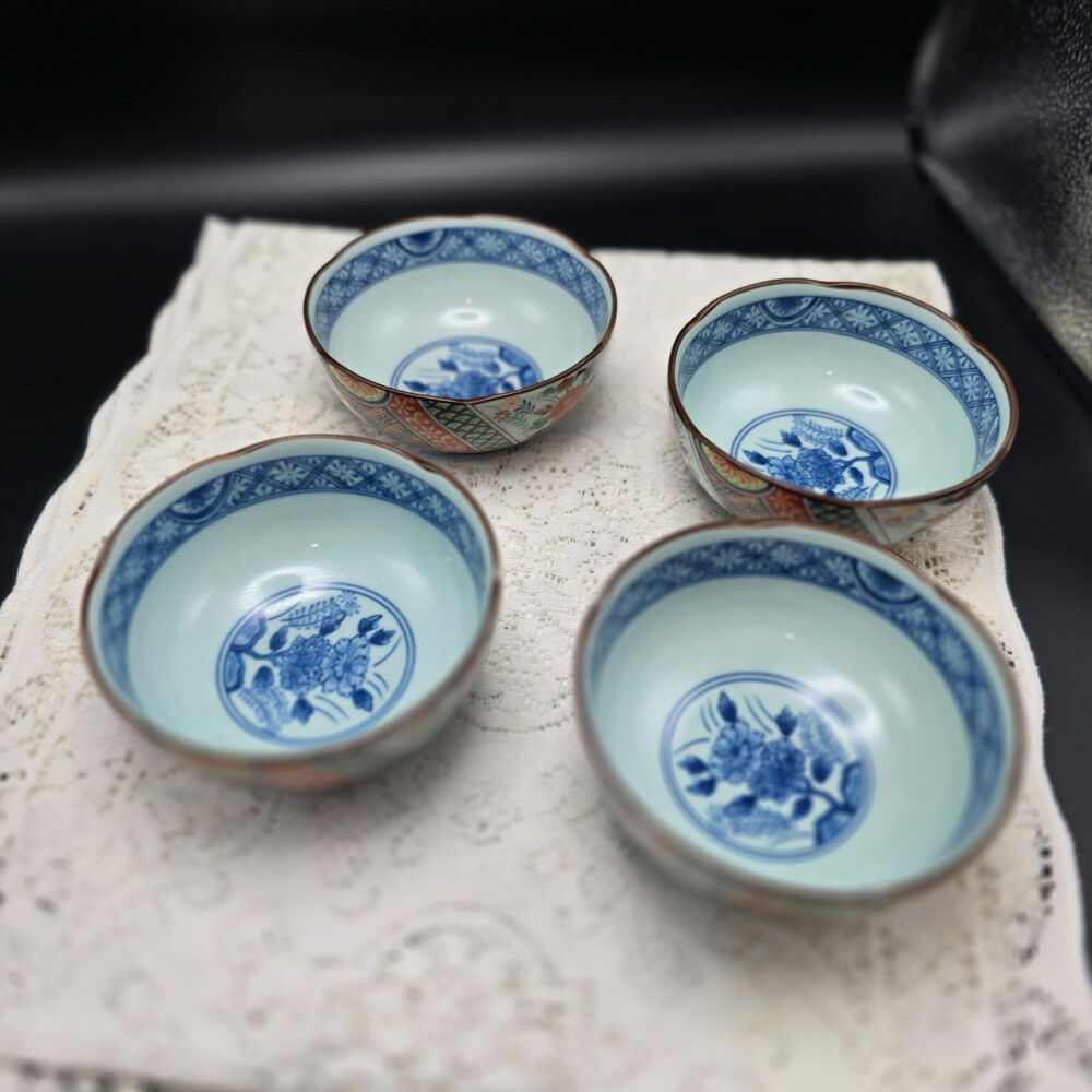 Vintage Japanese 4 small rice bowls Heavy, pictures don't do these justice.